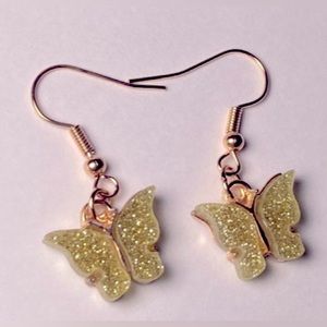 Yellow glittery butterfly earrings